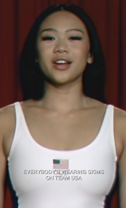 Athlete wearing USA tank top.